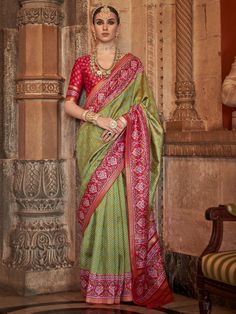 This stunning saree features a beautiful green color with intricate zari patola print work that exudes elegance and grace. The red color silk material blouse with patola print work perfectly complements the saree, adding a touch of sophistication to your overall look.
The saree and unstitched blouse material comes in a generous 5.50 meters length, giving you the flexibility to style it in various ways to suit your personal taste and body type. Whether you're attending festivals, weddings, or any Patola Print, Engagement Gown, Lehenga Crop Top, Lehenga Choli Wedding, Floral Lehenga, Party Wear Lehenga Choli, Reception Gown, Bollywood Lehenga, Ethnic Wear For Women