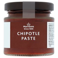 a jar of chipotle paste on a white background