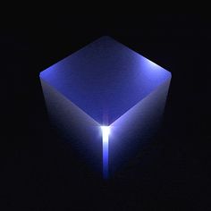 an illuminated cube in the dark with blue light coming from its center and back end