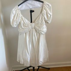 100 Perfect Silk. Gorgeous White Dress. I Believe It Retails For $1200. Purchased From The Realreal And Worn Once On My Bachelorette. Puff Sleeves. I Am A Size 4 And Fits Well. No Flaws. Zip Back. Just Dry Cleaned And Ready To Go! Silk Puff Sleeve Mini Dress For Evening, Chic Silk Mini Dress With Puff Sleeves, Chic Silk Puff Sleeve Dress For Party, Chic Silk Puff Sleeve Party Dress, Elegant Satin Puff Sleeve Summer Dress, Chic Silk Puff Sleeve Summer Dress, Silk Puff Sleeve Dress For Cocktail, White Bubble Dress, Bubble Dress