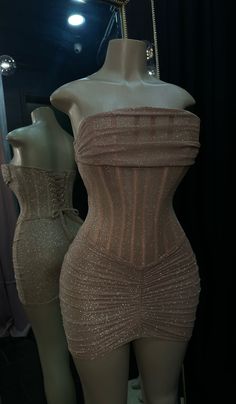 PRODUCT DESCRIPTION: A concept dress: Corset cups dress with an attached side skirt  MATERIAL/COLOR: Light copper SPANDEX with nude copper colored RHINESTONES. Has mesh on the "invisible part of the corset. FIT OF PRODUCT: True to size Party Corset With Sheer Fitted Bodice, Sheer Corset With Fitted Bodice For Party, Sheer Sleeveless Corset For Party, Gold Fitted Dress With Sheer Bodice, Elegant Sheer Corset For Party, Fitted Sheer Strapless Corset Dress, Sheer Fitted Corset Dress For Gala, Sheer Fitted Corset Dress For Party, Elegant Gold Corset Dress For Party