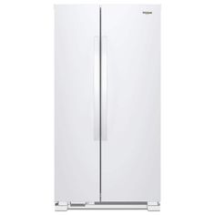 a white refrigerator freezer sitting on top of a white floor next to a wall