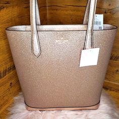 Nwt Kate Spade Tinsel Rose Gold Glitter Shoulder Tote Bag Handbag Holiday Firm Price Zip Top Tote 13”W X 12.5”H X 4.5d Smooth Glitter Signature Lining 1 Interior Zipper Pocket +Everything Is Authentic ++ From Smoke Free & Pet Free Home +++ No Trades ++++ Check Out My Other Listings I Have Available From Avantbeautybags Photos Are Taken With Bright Lighting And Colors May Vary Under Different Conditions (Your Device, Monitor, Etc). Rectangular Glitter Bags For Everyday Use, Rectangular Glitter Shoulder Bag For Everyday Use, Glitter Rectangular Shoulder Bag For Everyday Use, Pink Kate Spade Bag As A Gift, Rectangular Glitter Bag For Everyday Use, Pink Kate Spade Bag As Gift, Luxury Glitter Bags For Everyday Use, Luxury Gold Kate Spade Bag, Kate Spade Pink Bag For Gift