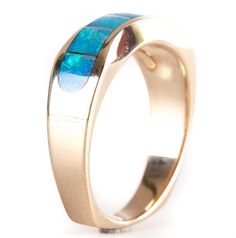 14k Yellow Gold AA Opal Inlay Wave Style Ring 7.2gMetal Information: 14k Yellow GoldTotal Weight: 7.2gBand Width: 3.3mmSize: 9.75Stone InformationMain StoneGem Type: OpalShape: InlayColor: MultiClarity/Quality: AANumber of Stones: 7Estimated Retail Price: $1610.00OUR PRICE: $1285.00SizingMany of our pieces can be re-sized at the buyers request. Please email us if you require our skilled professional services.45911 14k Gold Opal Ring With Polished Finish For Anniversary, Modern 14k Gold Opal Ring For Formal Occasions, Modern 14k Gold Opal Ring For Formal Events, Formal 14k Gold Opal Ring With Polished Finish, Oval 14k Gold Channel Set Jewelry, Formal 14k Gold Polished Opal Ring, Oval Channel Set 14k Gold Rings, Modern Opal Ring In 14k Gold With Polished Finish, 14k Gold Channel Set Round Jewelry