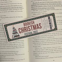 bookish christmas festival ticket laying on top of an open book