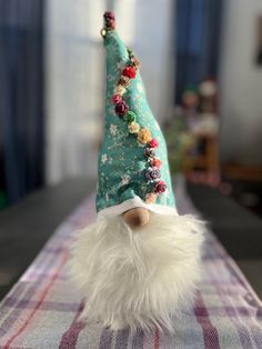 a close up of a gnome's hat on a table