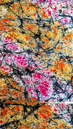 an abstract painting with orange, pink and yellow colors on it's surface is shown