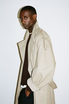 Inspired by the vintage, worn-in trench coats at the Melrose Trading Post. The Julian trench features exaggerated, oversized proportions constructed in a tumbled, broken-in cotton twill. Unlike traditional trench coats, Julian has a lived-in, ultra-relaxed feel for casual, everyday wear. Oversized Neutral Cotton Outerwear, Trench Coat Poses Men, Spring Oversized Gabardine Outerwear, Oversized Classic Gabardine Outerwear, Men’s Trench Coat Styling, Male Trench Coat, Men’s Trench Coat, Melrose Trading Post, Sacai Trench Coat