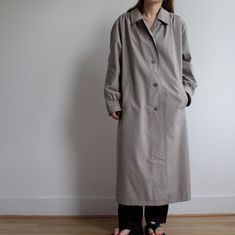 Vintage trench coat. Great vintage condition. Beautiful details to collar and pockets. Outer shell is 35% cotton and 65% polyester. Two side pockets and fully lined. Originally women's size L / XL depending on desire fit but please check measurements carefully as there is no size tag.  Armpit to armpit laying flat 63cm=25' Sleeve from armpit unfolded 46cm=18' Total length 117cm=46' Model is 164cm=5'4 tall UK size 10. Beige Workwear Raincoat With Pockets, Vintage Trench Coat, 80s Era, Vintage Leather Jacket, Style Expert, Vintage Leather, Silk Blouse, Trench Coat, Jackets & Coats