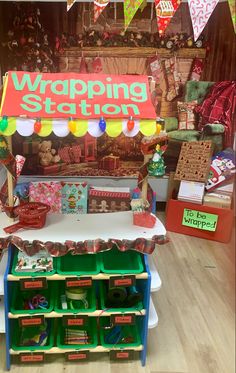 a display in a store filled with lots of boxes and items for wrapping on the table