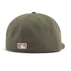 A Blue Jays custom for neutral colors. Perfect for autumn or pale wave fits. With New Olive wool and logo in New Olive/Perfect Tan, with an accent of Wicker on the leaf to balance it out, you can't go wrong with this hat. Tonal side flag finishes this very special exclusive. Hat Material: 100% PolyesterCrown: New OliveVisor: New OliveButton: New OliveUndervisor: GreyFront Logo: New Olive/Perfect Tan/WickerNew Era Flag: New OliveRear Logo: Perfect Tan/New Olive Green Fitted Hat With Flat Brim For Sports Events, Green Flat Brim Fitted Hat For Sports Events, Green Fitted Hat For Baseball Season, Green Snapback Hat For Sports Events, Green Flat Bill Fitted Hat For Sports, Green Baseball Cap With Logo Patch For Sports, Green Snapback Fitted Hat For Sports Events, Green Fitted Hat With Curved Brim For Sports, Green Snapback Sports Hat