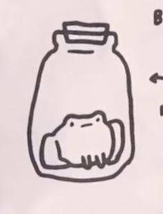 a drawing of a glass jar with a frog in it's mouth next to an arrow