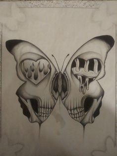 a drawing of two skulls in the shape of a butterfly