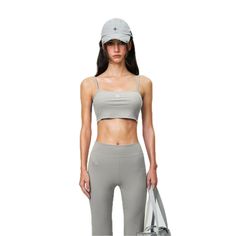 SMFK Compass Hug Ultra-Short Sports Strap Top Gray - Design: The SMFK short sports strap features an adjustable strap on the back and an embroidered cross on the chest, offering a stylish and functional design. Size Chest Back Length XS 58cm 17.1cm S 62cm 17.8cm M 66cm 18.5cm L 70cm 19.2cm Model Size Info (In CM): Height 177, Weight 48 kg Composition: 91.4% Viscose, 8.6% Spandex Sleeveless Seamless Micro-elastic Activewear, Versatile Sleeveless Micro-elastic Activewear, Sleeveless Micro-elastic Elastane Activewear, Sleeveless Micro-elastic Sports Top, Compressive Cross-back Yoga Top, Suit Pant, Skirt Socks, Gray Design, Strap Tops