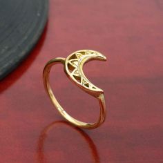 Product:-Ring Material:- Brass Size:- All size available Brass Half Moon Ring, Crescent Moon Ring, Mandala Stackable Ring, gold jewellery, Simple Bohemian Ring,Dainty Ring,Cute Ring, Minimal Ring,   ❥ Customers' satisfaction is our biggest priority, please contact us with any questions/queries for future or existing orders, and we will do our best to make sure you are happy with your order. ❥Please make sure to add the correct address during checkout. You can return your purchased item within 15 days after successful delivery. We offer a 100% "Money Back Guarantee" if you are not satisfied with your purchase. ❥If you are not satisfied with your purchased items then contact with us first before leaving negative or neutral feedback or opening disputes. We believe in solving the issues. Gold Moon Charm Promise Ring, Gold Promise Ring With Moon Charm, Gold Adjustable Ring With Moon Charm, Adjustable Gold Ring With Moon Charm, Symbolic Moon Shaped Gold Rings, Gold Open Ring With Moon Phase Detail, Gold Open Ring With Moon Phase, Handmade Gold Moon Shaped Ring, Adjustable Moon Shaped Gold Ring