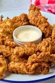 fried chicken with ranch dressing on a plate