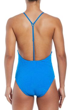 The flattering shape of this one-piece starts with a scoop neckline that gives way to an elongating T-strap design along the open back. T-strap back Full back coverage Lined 93% recycled polyester, 7% spandex Hand wash, line dry Imported Beach Bodysuit With Scoop Back And Moderate Coverage, Fitted Blue Swimwear With Low Back, Beach Bodysuit With Solid Scoop Back, Beach Bodysuit With Scoop And Solid Back, Scoop Back Bodysuit With Solid Back For Poolside, Beach Swimwear With Adjustable Straps And Scoop Back, Blue Beachwear Bodysuit With Moderate Back Coverage, Fitted Low Back Blue Swimwear, Nike Summer Pool Bodysuit