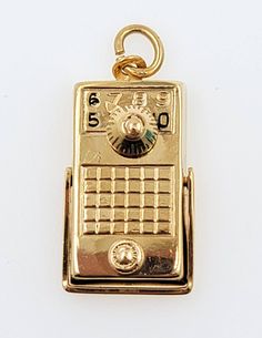 Vintage 1960 Handmade 14K Yellow Polished Gold Movable Transistor Necklace Charm Unisex   Pendant This pendant is in excellent condition, it would make a great gift.   The pendant length approx.: 21.2mm (not including bail) The pendant width approx.:11.4 mm  Charm thickness approx.: 4.2mm Pendant weight: 3.1g Hallmarks:  14K Will be placed into a suitable gift box Free shipping within the U.S. Retro Gold Jewelry Stamped 14k, Mid-century Gold Necklace Gift, Retro Gold Engraved Jewelry, Retro Engraved Gold Jewelry, Retro Yellow Gold Jewelry, Mid-century Gold Jewelry For Formal Occasions, Necklace Charm, Pendant Necklaces, Charm Necklace