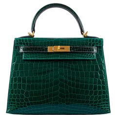 There are some colors reserved exclusively for Hermes’ exotic skins. These colors are typically produced in extremely limited numbers, but over long periods of time, making them both very rare, but also classic collection staples. This exceptional store-fresh 28cm Sellier Kelly is done in shiny Emerald & Vert Fonce Nilo Crocodile with gold hardware, the ultimate combination. Produced earlier this year, it is the pinnacle for Hermes bags in terms of color, skin, and style. A store-fresh classic t Brushed Gold Hardware, Hermes Kelly 28, Hermes Handbags, Hermes Bags, Classic Collection, Birkin Bag, Very Rare, Shades Of Green, Gold Hardware