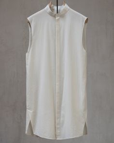 A summer top designed to stand-alone as a paradoxically refined sleeveless shirt, as an over-layer to elevate any t-shirt, or as an interlocking compliment the Chronos Mid-sleeve. Fabricated in a luxurious organic Japanese cotton that utilizes high-twisted yarns to achieve a shirt that's as light as it gets while staying strong enough to age well for decades. The shirt features a unique architectural side vent + seaming, extremely fine construction techniques, minimal collar, and a hidden placke Twist Shirt, Staying Strong, Sleeveless Button Down Shirt, Japanese Shirt, Construction Techniques, Japanese Tshirt, Japanese Cotton, Aging Well, Sleeveless Tshirt