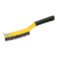 a yellow and black brush with long handle