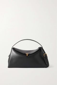 Shop TOTEME T-Lock leather shoulder bag, Explore the latest TOTEME women's collection today on NET A PORTER Black Handbag, Jo Malone London, Designer Shoulder Bags, Ski Wear, Mr Porter, Who What Wear, Leather Handbag, Net A Porter, Hobo Bag