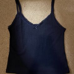 H&M Dark Navy Lacy Tank Top With Bow, Excellent Condition Never Worn. Will Accept Offers For Less, Thanks For Looking! Lacy Tank Tops, Blue Seamless V-neck Camisole, Blue V-neck Seamless Camisole, Blue Camisole Top With Lace Trim, H&m Fitted Cami Top, Blue Lace Trim Camisole Top, Vintage Tanks, Dark Blue Tank Top, Summer Shopping List