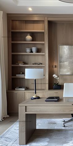 a home office with wood paneling and built - in shelving