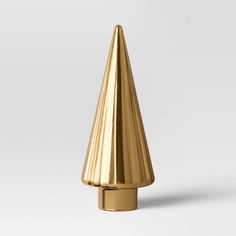 a gold cone shaped object on a white background