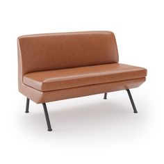 a brown leather couch sitting on top of a metal frame