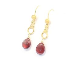 Gorgeous hand crafted solid 18K Gold earrings by NewWorldGems! These one of a kind beauties are just over 1.75" in length. Andesine was first described in 1841 for an occurrence in the Marmato mine,in Columbia and has only recently been used for beads. The stunning cherry red coloring is 100% natural! This stone is a member of the Labradorite/Feldspar family of gemstones. Elegant Gold Teardrop Earrings With Gemstone, Handmade Yellow Gold Drop Jewelry, Gold Briolette Earrings For Formal Occasions, Handmade Briolette Yellow Gold Earrings, Gold Briolette Earrings, Handmade Yellow Gold Briolette Earrings, 14k Gold Briolette Earrings, Formal Teardrop Linear Earrings Gold Plated, Formal Gold Plated Teardrop Linear Earrings