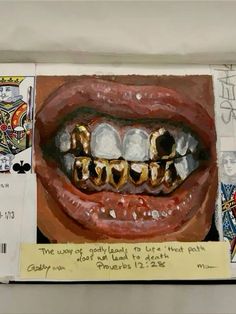 an open book with pictures of teeth and other things on it's cover,