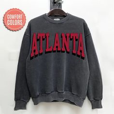 "comfort colors Atlanta Football sweatshirt, Atlanta Football Shirt, Atlanta Football Gift, Atlanta Sunday Football -Please check Color and Size Charts before placing the order. You can find them in the listing's photos (Depending on what device you are viewing this listing colors may vary slightly). -Returns and exchanges are accepted only if there are defects \"No Extra Costs\" We create custom t-shirts with great designs for everyone's liking. If you don't find the size or color you would like, please message us and we will be happy to  accommodate! comfort colors Atlanta Football sweatshirt, Atlanta Football Shirt, Atlanta Football Gift, Atlanta Sunday Football PRODUCT Sweatshirt Comfort Colors® 1566     80% ring-spun cotton, 20% polyester     Medium-heavy fabric (9.5 oz /yd² (322.1 g/ Oversized Fan Apparel Sweatshirt For College, Oversized College Sweatshirt For Fan Apparel, Oversized Collegiate Hoodie With Crew Neck, Oversized Fan Apparel Sweatshirt For Fall, Oversized T-shirt For College, Gray Casual Sweatshirt With Lettering, Gray Lettering Casual Sweatshirt, Casual Gray Sweatshirt With Lettering, Oversized Gray Varsity Sweatshirt