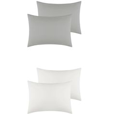 three white pillows on a white background