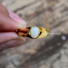 Handcrafted beautiful 925 solid silver ring => Ring Size - Select ring size from drop down list => Gemstone Type - Ethiopian opal => Gemstone Size - 6 mm x 8 mm => Metal Type - Select metal from drop down list ** BECAUSE WE USE NATURAL STONES SO STONES MAY VARY IN COLOR ** Available in :- ✪ Copper ✪ 925 Solid sterling silver ✪ 14k rose gold filled ✪ 14k gold vermeil NOTE - Because we use Natural stones , the color could be slightly different. ~ Feel free to ask me about custom made designs. ❏ Im Opal Ring Men, Opal Signet Ring, Elegant Silver Ethiopian Opal Ring, Silver Ethiopian Opal Ring With Cabochon, 14k Gold Opal Ring, Opal Silver Ring, Silver Multi-stone Ethiopian Opal Ring, Gold Opal Ring, Elegant Ethiopian Opal Ring, Oval Cabochon