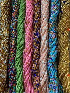 "Hey Beautiful! Welcome to SeseAdornment where you find beautiful handmade body jewelry right from Ghana. Please read carefully & message me with any questions. I'd love to be your lifetime vendor. ✱ Beads are made with cotton threads ✱ Lengths 40\"-50\" ✱ Bead sizes 6/0 ✱ No Returns or exchanges ✱Processing time is 3- 5 Business days ✱Ships via DHL 3-5 Business days, ✱ Dhl requires customer's phone number for shipment so please include it with your number." Ghana Waist Beads, Bohemian Multicolor Waist Beads With Gold Beads, Multicolor Beaded Waist Beads For Party, Traditional Party Waist Beads, Multicolor Waist Beads With Gold Details, Festive Multicolor Beaded Necklaces With Tiny Beads, Festive Multicolor Tiny Beaded Necklaces, Multicolor Tiny Beaded Bracelets For Festive Occasions, Bohemian Multicolor Waist Beads With Faceted Beads