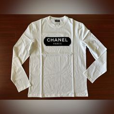 Up For Sale Is A Brand New Condition 100% Authentic Chanel Uniform White Long Sleeves T-Shirt Tee Size S Chest 19.75” Length 26.75” Shoulder 17.25” Sleeve Length 24.5" Hem 19.5" Chanel Top, Chanel White, White Long Sleeves, Logo Shirt, Long T Shirt, Chanel Paris, Long Tshirt, New Logo, Pretty Outfits