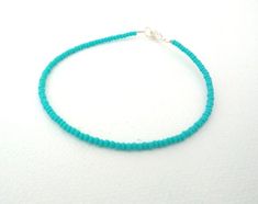 Turquoise bracelet dainty bracelet seed bead bracelet beaded bracelet boho chic teal bracelet aqua b Minimalist Blue Bracelet For Summer, Minimalist Blue Bracelets For Summer, Handmade Minimalist Turquoise Bracelets, Minimalist Beaded Turquoise Bracelet, Minimalist Beaded Bracelets For Summer, Minimalist Turquoise Beaded Bracelets, Minimalist Turquoise Beaded Bracelet, Minimalist Turquoise Beaded Friendship Bracelets, Teal Bracelet