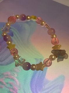 Super cute beaded Fairy princess bracelet! A different bead color represents twelve different sisters. Made of stretchy elastic Kandi Core, Princess Bracelet, Beaded Fairy, Fairy Party, Fairy Parties, Cozy Aesthetic, Fairy Princess, Fairy Princesses, Beaded Bracelet