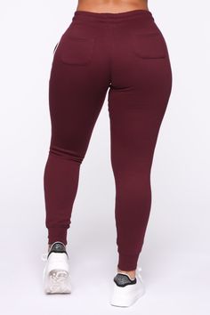 Red Stretch Sweatpants For Jogging, Red Athleisure Bottoms For Fall, Red Stretch Joggers For Jogging, Red Fitted Jogging Bottoms, Fitted Red Jogging Bottoms, Stretch Bottoms For Jogging In Fall, Stretch Full Length Joggers For Fall, Fall Stretch Full-length Joggers, Fall Stretch Full Length Joggers