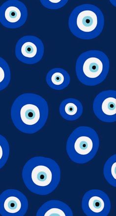 an image of blue and white eyeballs on a dark background with the words,'eyes