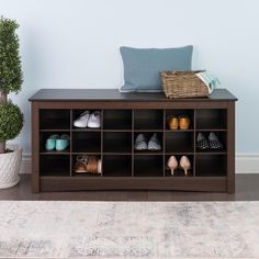 a shoe rack with several pairs of shoes on it