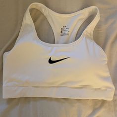 White Nike Sports Bra, Perfect Condition. Never Used. Nike Fitted White Sports Bra, Fitted White Nike Sports Bra, White Racerback Activewear For Light Sports, Nike White Fitted Sports Bra, White Athleisure Sports Bra For Light Sports, White Sports Bra For Workout, Sporty White Sports Bra For Workout, White Fitted Activewear For Sports, White Medium Support Activewear For Sports