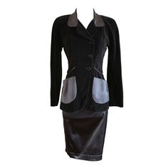 Fitted Skirt Suit With Pockets For Office, Fitted Skirt Suit With Pockets For Fall, Fitted Skirt Suit With Pockets For Work, Fitted Black Skirt Suit For Winter, Winter Black Fitted Skirt Suit, Tailored Black Skirt Suit For Fall, Black Fitted Uniform Style Blazer, Black Fall Skirt Suit For Business, Black Fall Business Skirt Suit