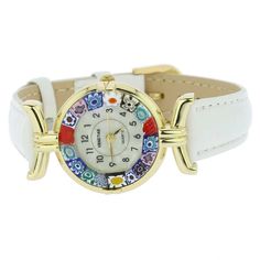 This elegant Murano glass watch is a unique timepiece featuring high-quality workmanship and the most famous Murano technique- Millefiori (a thousand flowers)- which has become a trademark of Murano glass making. Stylized flowers in beautiful colors grace the hand-made face of this watch and give it a trendy and unmistakably Venetian look. This Murano watch adds a perfect accent to any wardrobe and works equally well for your casual outing or a night on the town. The face of this Murano glass wa Murano Glass Earrings, Italian Leather Handbags, Watches Collection, Murano Glass Jewelry, Italian Bags, Women Watches, Handmade Handbags, Elegant Accessories, Venice Italy