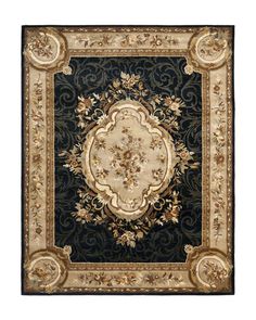 a black and gold rug with an ornate design on the center, surrounded by flowers