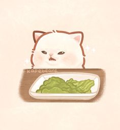 a cat sitting behind a plate of food with lettuce on it's side