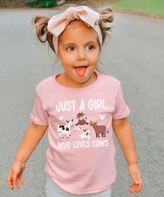 An adorable cow tshirt for your adorable girl!  Just a girl who loves cows is the perfect farm birthday party shirt or gift for any cow loving girl!   * Q U I C K * F A C T S * ✺ 100% preshrunk cotton ✺ Heather colors are 52% combed and ring-spun cotton, 48% polyester ✺ Athletic Heather is 90% combed and ring-spun cotton, 10% polyester ✺ Inside out and wash and dry normally (on cool for best results). Do not iron decoration. ✺ printed using DTG Direct to Garment printing.  ✺ Colors may vary due Cute Cotton T-shirt With Cow Print, Cute Short Sleeve Cow Print T-shirt, Cute Cow Print Short Sleeve T-shirt, Cute Cow Print Cotton T-shirt, Cow Birthday, Cow Tshirt, Farm Birthday Party, Cow Gifts