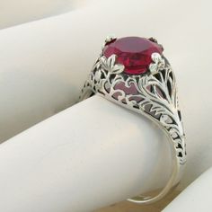 Vintage Estate Lab Created Ruby Solitaire Filigree Ring. 925 Solid Sterling Silver. Intricate Floral Details. Stamped 925. Excellent Condition/Like New. Victorian Sterling Silver Filigree Ring With Intricate Design, Victorian Filigree Ring With Intricate Design In Sterling Silver, Sterling Silver Victorian Filigree Ring, Elegant Carved Sterling Silver Rings, Elegant Carved Filigree Ring For Anniversary, Oval Carved Filigree Ring For Anniversary, Classic Carved Filigree Ring For Anniversary, Classic Engraved Sterling Silver Filigree Ring, Elegant Silver Carved Filigree Ring