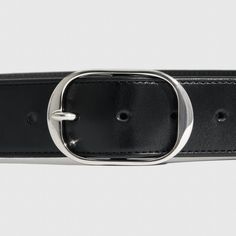 Go for a belt that suits your lifestyle with this elevated basic, the ultimate sophisticated leather staple. Expand your vision of iconic luxury by finishing any look with our genuine leather belt, elegantly completed with a metal buckle. Modern Black Belt With Rectangular Buckle, Timeless Leather Belts For Office, Timeless Leather Belt For Office, Modern Belts With Rectangular Buckle For Business, Modern Leather Belt With Metal Pin Buckle, Leather Belts With Silver Buckle For Business, Classic Silver Belt For Formal Occasions, Classic Silver Formal Belt, Silver Classic Formal Belt